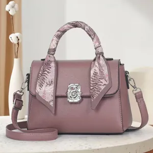 Vintage dusty pink leather tote bag with silk scarf handle and silver metal clasp