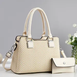 Ensemble sac à main deux pièces pour femme en textile beige avec bordure en similicuir