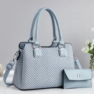 Ensemble sac à main deux pièces bleu clair avec motif chevron et bandoulière