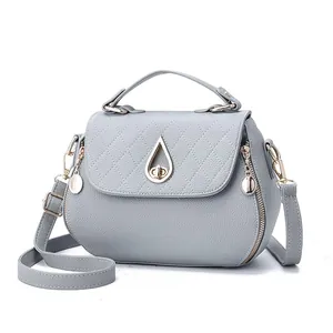 Chic light grey PU leather handbag with quilted flap and golden teardrop lock for women