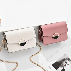 Borse a tracolla quadrate minimaliste in beige e rosa con fibbie in metallo dorato