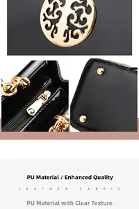 Macro details of black patent leather fabric and gold hardware on a chic tote bag