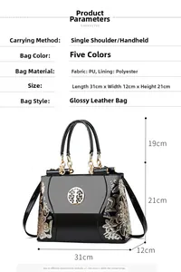 Close-up of black patent leather handbag with floral embroidery and detailed size chart