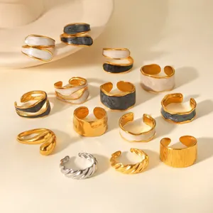 Vintage stainless steel open rings collection with gold finish and enamel marble patterns