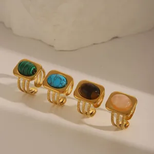 Set of 4 vintage 18K gold plated geometric rings with turquoise and malachite stones