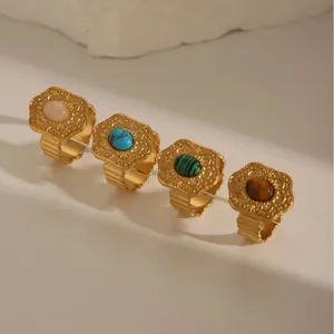 Set of four 18K gold plated stainless steel geometric rings with colorful turquoise stones