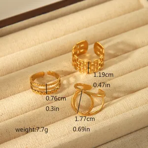 Detailed view of three 18k gold plated adjustable rings with mesh and layered bead designs