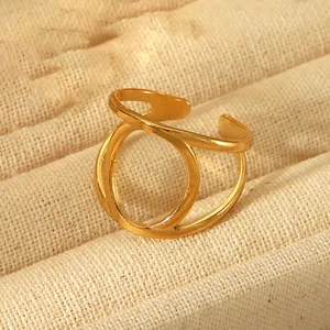 Detail view of 18k gold plated stainless steel open ring with hollow circular design