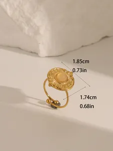 Detail view of gold turquoise ring with sunburst texture and dimension markings