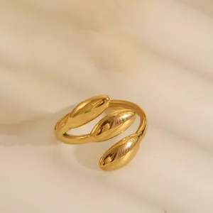 Detailed macro view of 18k gold plated stainless steel spiral wrap open ring for women