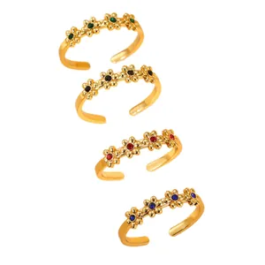 Set of four adjustable open rings with gold plating and colorful flower zirconia stones