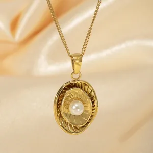 18k gold plated stainless steel necklace with sunburst oval pearl pendant on silk