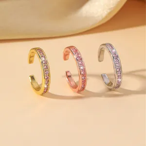 Three-piece set of elegant ear bone clips with pink zircon stones in gold and silver