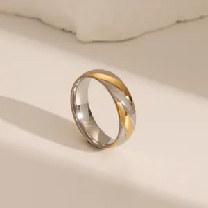 Anillo de cuerda trenzada bicolor minimalista en acero inoxidable pulido oro y plata