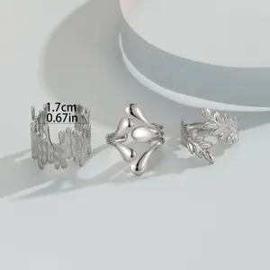 Three-piece silver stainless steel ring set with lava texture and leaf design