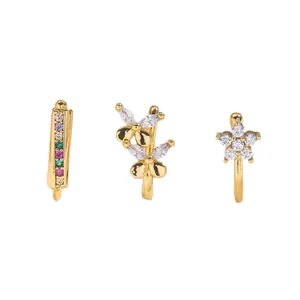 Three-piece gold nose clip set with rainbow zircon, flower, and star designs