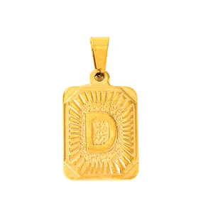 Macro detail of gold plated stainless steel rectangle pendant with embossed letter D