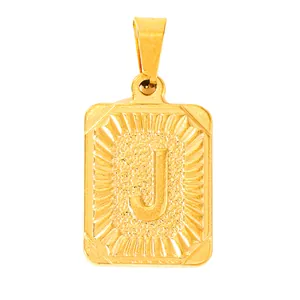 Detailed view of square gold plated stainless steel pendant with letter J relief