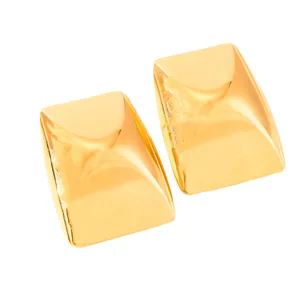 Macro shot of 18k gold plated stainless steel square stud earrings with geometric facets
