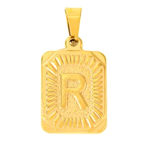 Macro detail of gold stainless steel rectangular pendant featuring embossed letter R