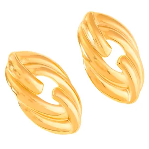 Detail of 18k gold plated geometric hollow stud earrings with a polished finish