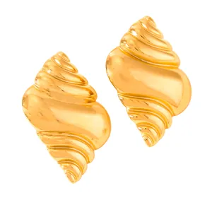 Detail of 18k gold plated stainless steel stud earrings with seashell spiral design
