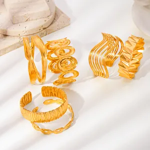 Bracciali aperti in acciaio inossidabile placcato oro 18k con trame geometriche eleganti