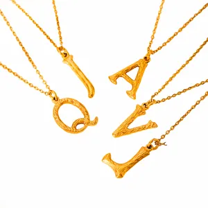 Gold plated stainless steel letter necklaces with organic textured surface A I Q V L