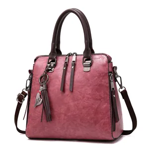 Retro marble texture PU leather tote bag in dark rose pink with a cat pendant accessory