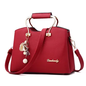 Red large capacity handbag with gold handles and floral pearl charm for women