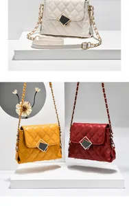 Detailed view of quilted faux leather chain bags in white, yellow, and burgundy shades