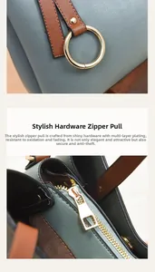 Detail of durable gold-plated hardware and smooth zipper on a soft PU leather handbag
