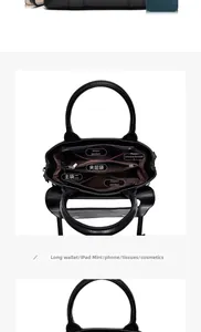 Intérieur du sac à main en cuir noir avec compartiments pour iPad et cosmétiques