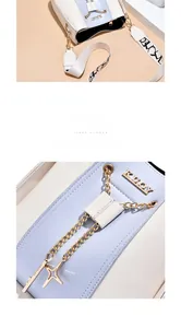 Macro view of gold chain and star ornament on a stylish blue and white bucket bag detail