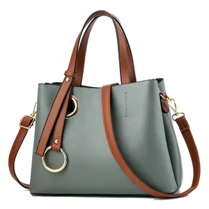 Minimalist large PU leather tote bag in grey-green with brown straps and gold ring detail