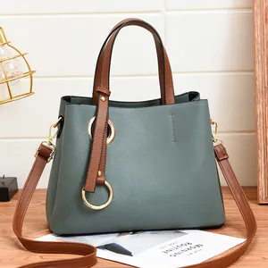 Morandi green PU leather tote bag with dark brown contrast straps and gold ring detail