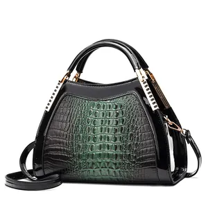 Classic large black and deep green crocodile pattern tote bag with gold metal hardware