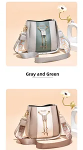 Detail view of stylish crossbody bucket bags in grey-green and beige color variants