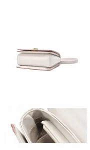 Detailansicht der weißen Stepptasche mit Seitenfalten und Reißverschluss-Innenfach