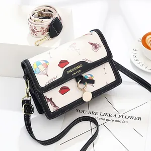 Vintage style square crossbody bag with hot air balloon print and dual shoulder straps