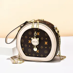 Sac bandoulière rond classique avec motif vintage et breloque chat mignon pour femme