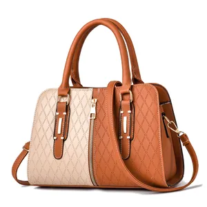 Fashionable two-tone faux leather handbag with diamond embossing and gold hardware