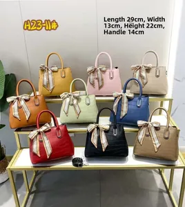 Detailed size chart showing 29x13x22cm dimensions for large crocodile texture handbags