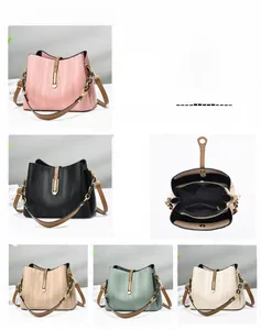 Vertical textured bucket bags in five colors with brown straps and interior layout