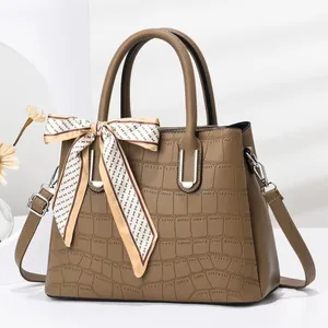 Elegant brown stone pattern tote bag for women with decorative silk scarf and silver hardware