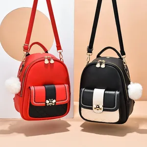 Fashionable bee mini backpacks with quilted pockets and plush ball charms in red and black