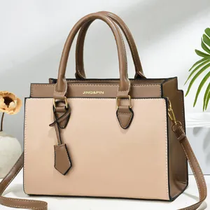 Chic color-block women's shoulder handbag in beige and brown with adjustable strap