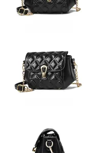 Detailed view of black quilted crossbody bag with gold hardware and chain strap