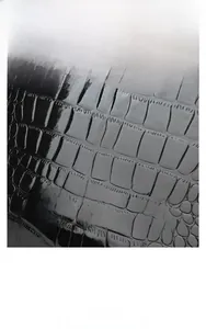 Close-up of the Midnight Black crocodile-embossed genuine cowhide leather texture detail