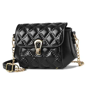 Classic black quilted crossbody bag with gold horseshoe clasp and leather chain strap